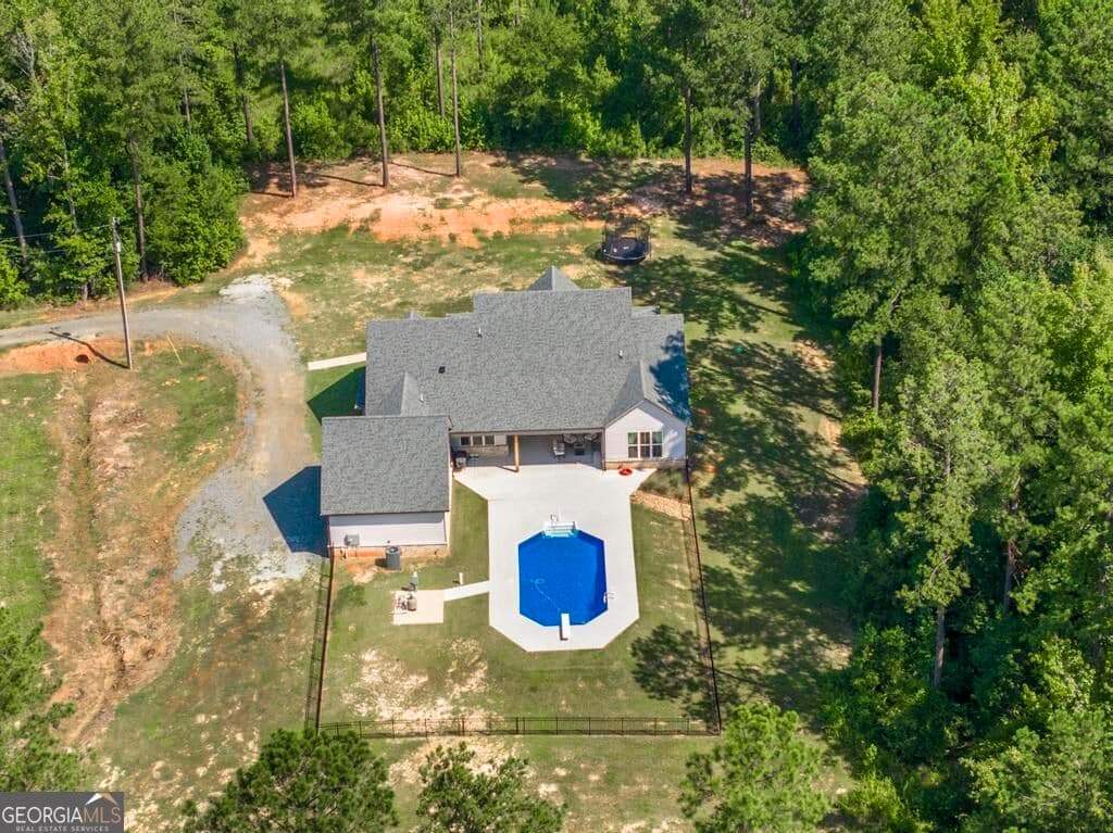 5 bedroom, 4 bathroom, 2,769 sq ft single family residence for sale at 665 Edge Road, Forsyth, GA 31029 — photo 7