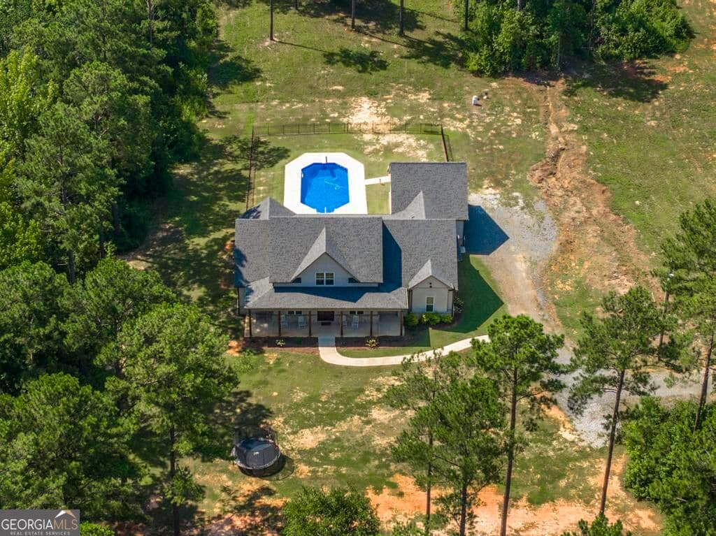 5 bedroom, 4 bathroom, 2,769 sq ft single family residence for sale at 665 Edge Road, Forsyth, GA 31029 — photo 3
