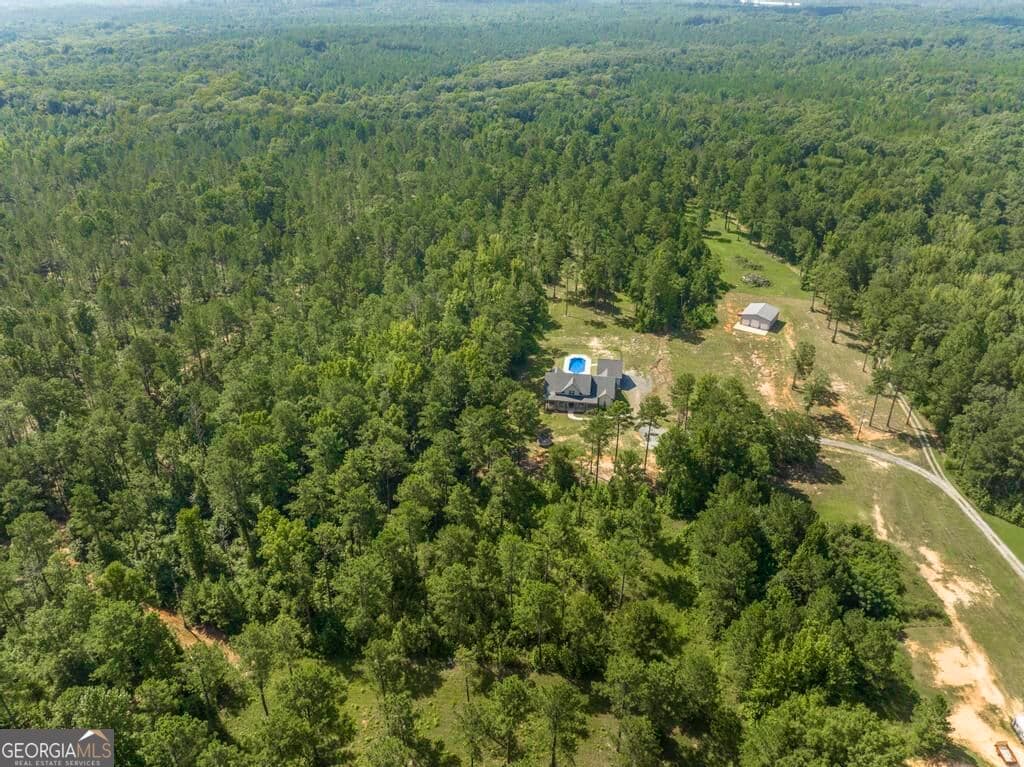 5 bedroom, 4 bathroom, 2,769 sq ft single family residence for sale at 665 Edge Road, Forsyth, GA 31029 — photo 5