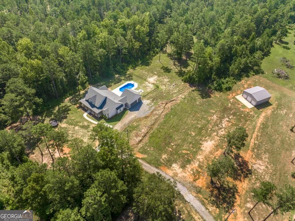 5 bedroom, 4 bathroom, 2,769 sq ft single family residence for sale at 665 Edge Road, Forsyth, GA 31029 — photo 4