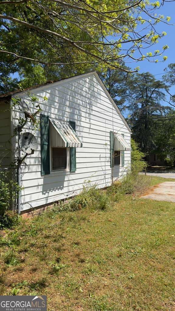 2 bedroom, 1 bathroom, 812 sq ft single family residence for sale at 1219 Burton Avenue, Macon, GA 31203 — photo 3