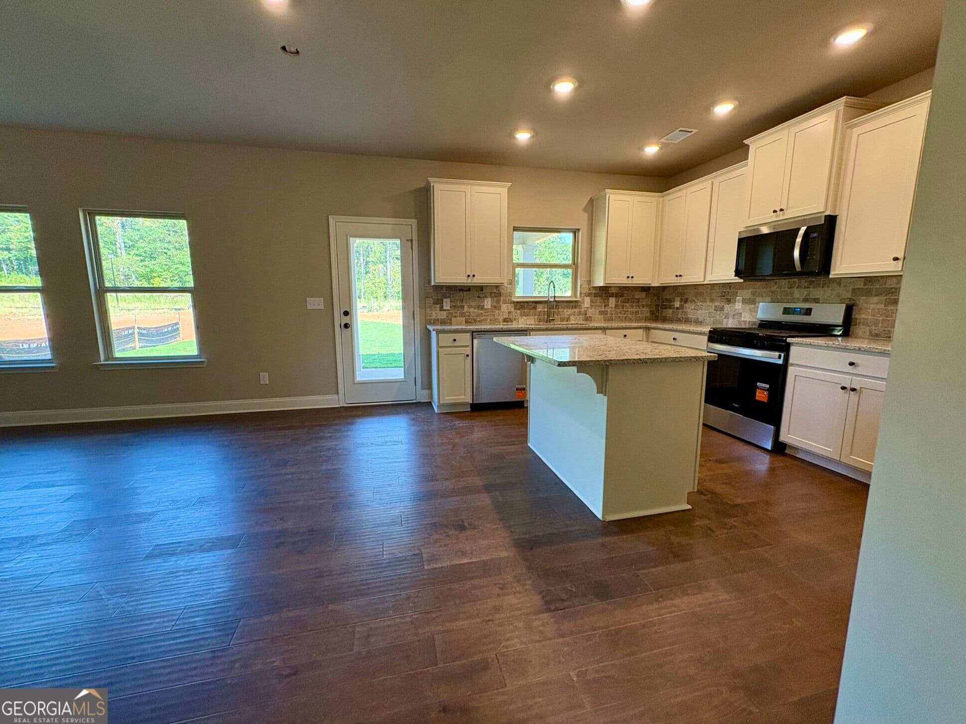 5 bedroom, 3.5 bathroom single family residence for sale at 1027 Lakeview Oaks Court 44-C, Grayson, GA 30017 — photo 6