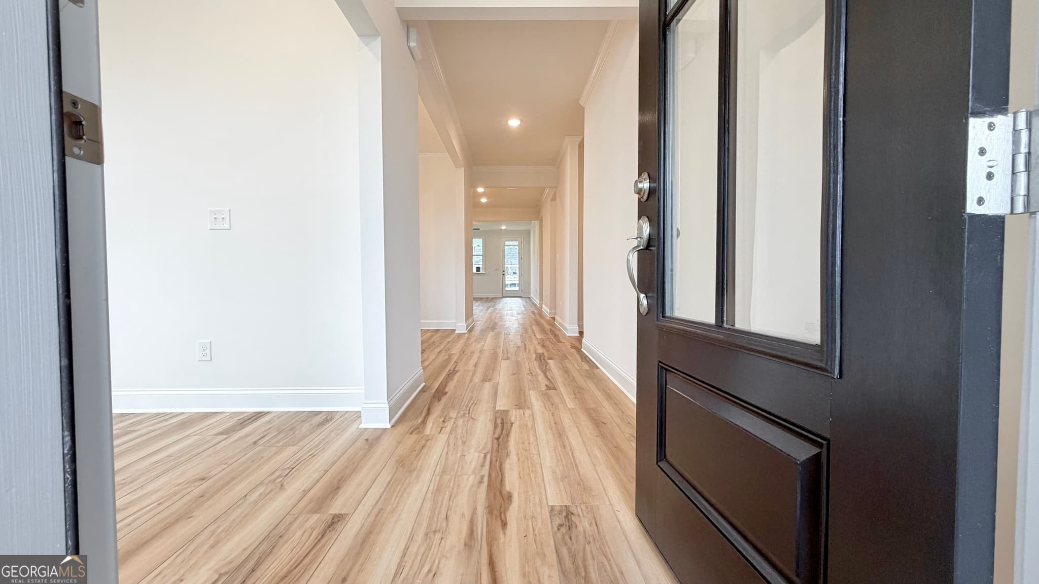 3 bedroom, 2.5 bathroom, 2,200 sq ft single family residence for sale at 311 Grand Wehunt Drive, Hoschton, GA 30548 — photo 2