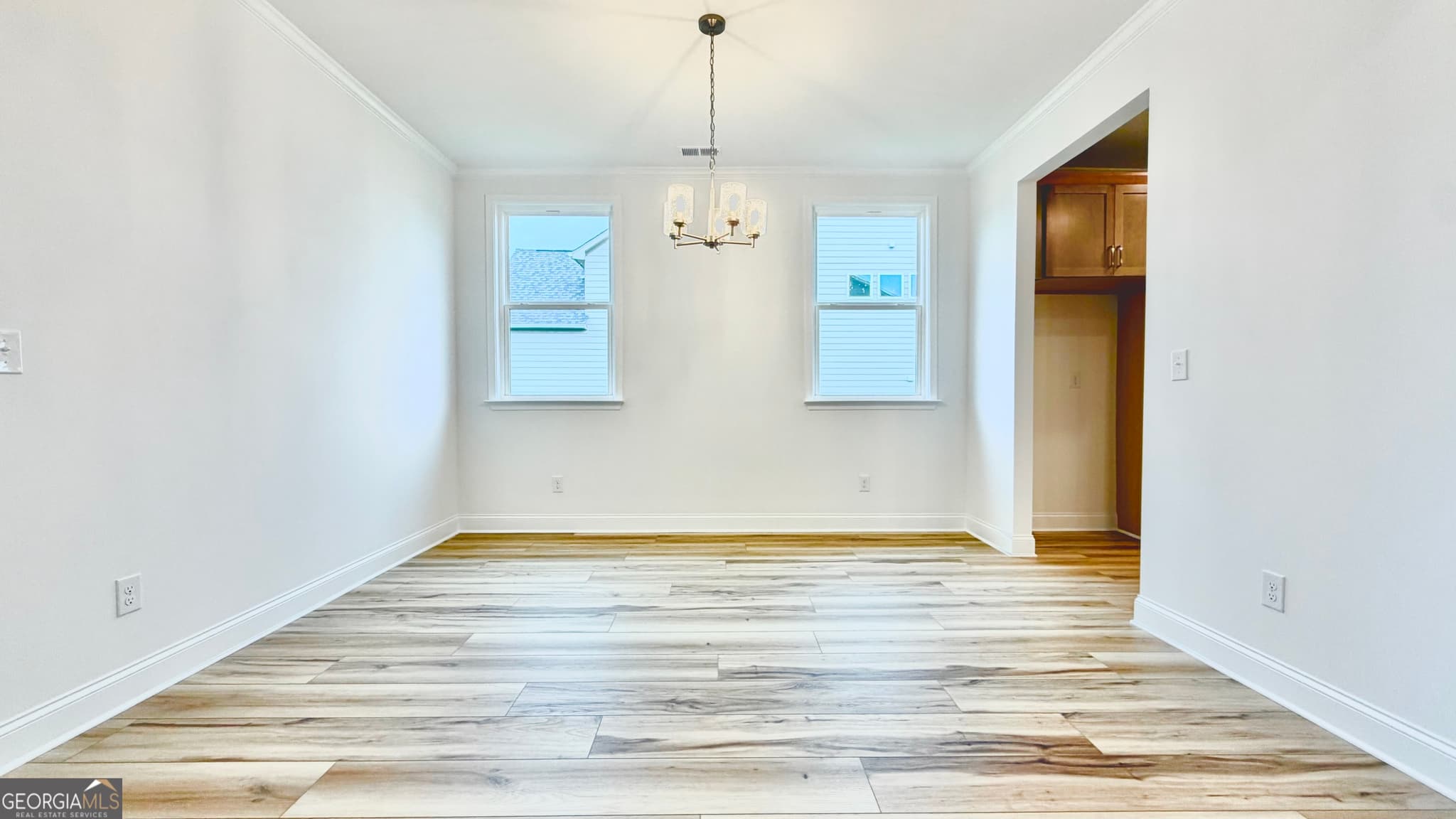 3 bedroom, 2.5 bathroom, 2,200 sq ft single family residence for sale at 311 Grand Wehunt Drive, Hoschton, GA 30548 — photo 4