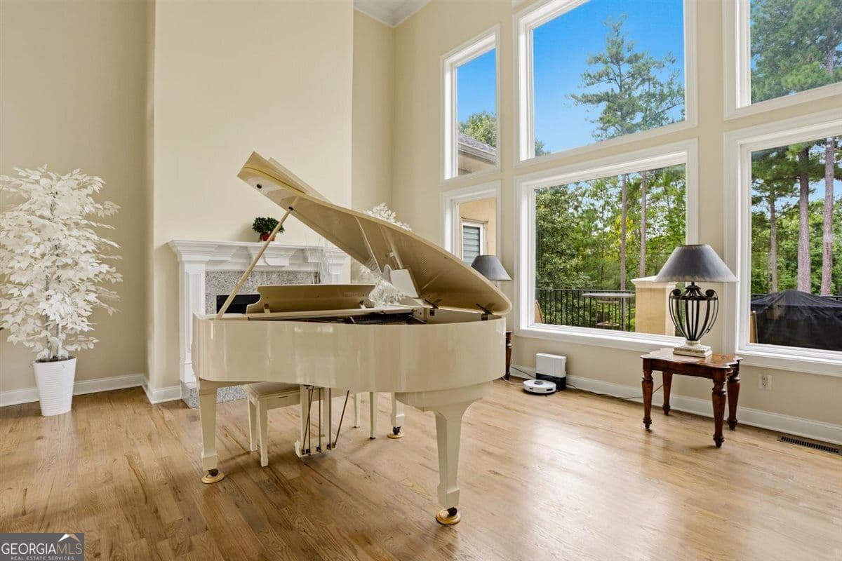 5 bedroom, 4.5 bathroom, 6,090 sq ft single family residence for sale at 124 Fairway Run, Forsyth, GA 31029 — photo 6