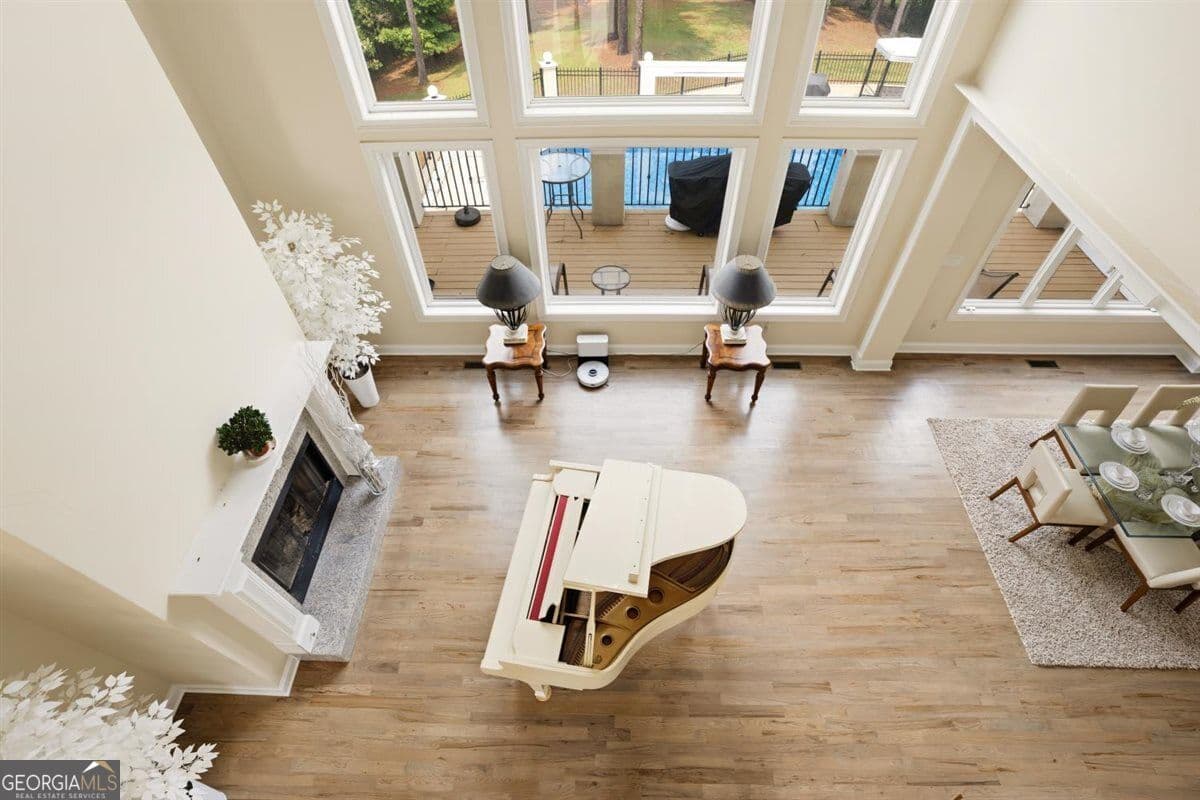 5 bedroom, 4.5 bathroom, 6,090 sq ft single family residence for sale at 124 Fairway Run, Forsyth, GA 31029 — photo 7