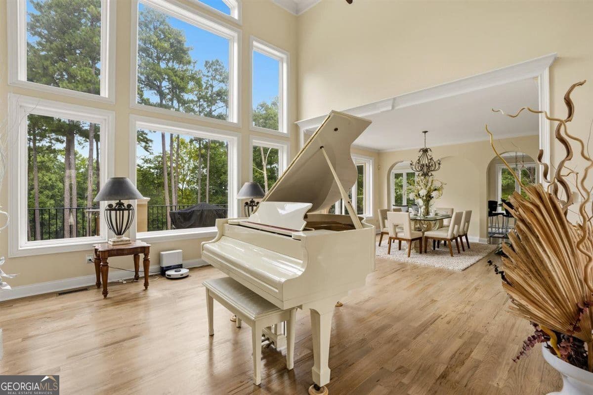 5 bedroom, 4.5 bathroom, 6,090 sq ft single family residence for sale at 124 Fairway Run, Forsyth, GA 31029 — photo 4