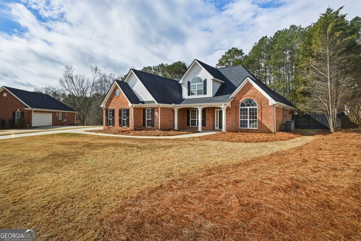5 bedroom, 3 bathroom, 3,011 sq ft single family residence for sale at 122 Shadow Lake Drive, Conyers, GA 30094 — photo 5