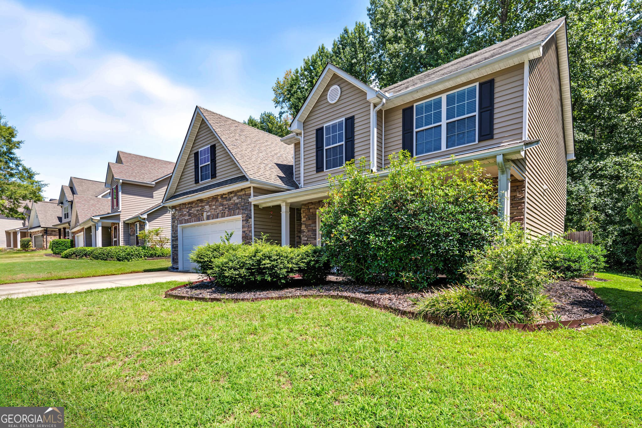 4 bedroom, 2.5 bathroom single family residence for sale at 3490 Watson Gate Road, Loganville, GA 30052 — photo 2