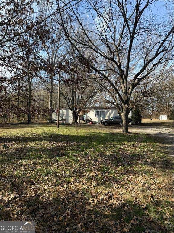 3 bedroom, 2 bathroom, 1,838 sq ft manufactured home,single family residence for sale at 305 Brand Road, Loganville, GA 30052 — photo 5