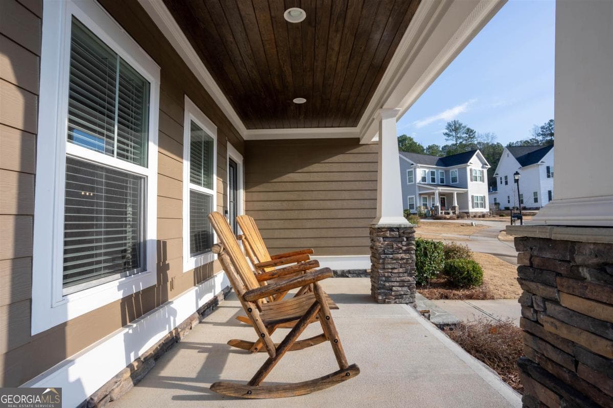 4 bedroom, 3 bathroom, 2,352 sq ft single family residence for sale at 1231 Carriage Ridge Drive, Greensboro, GA 30642 — photo 2