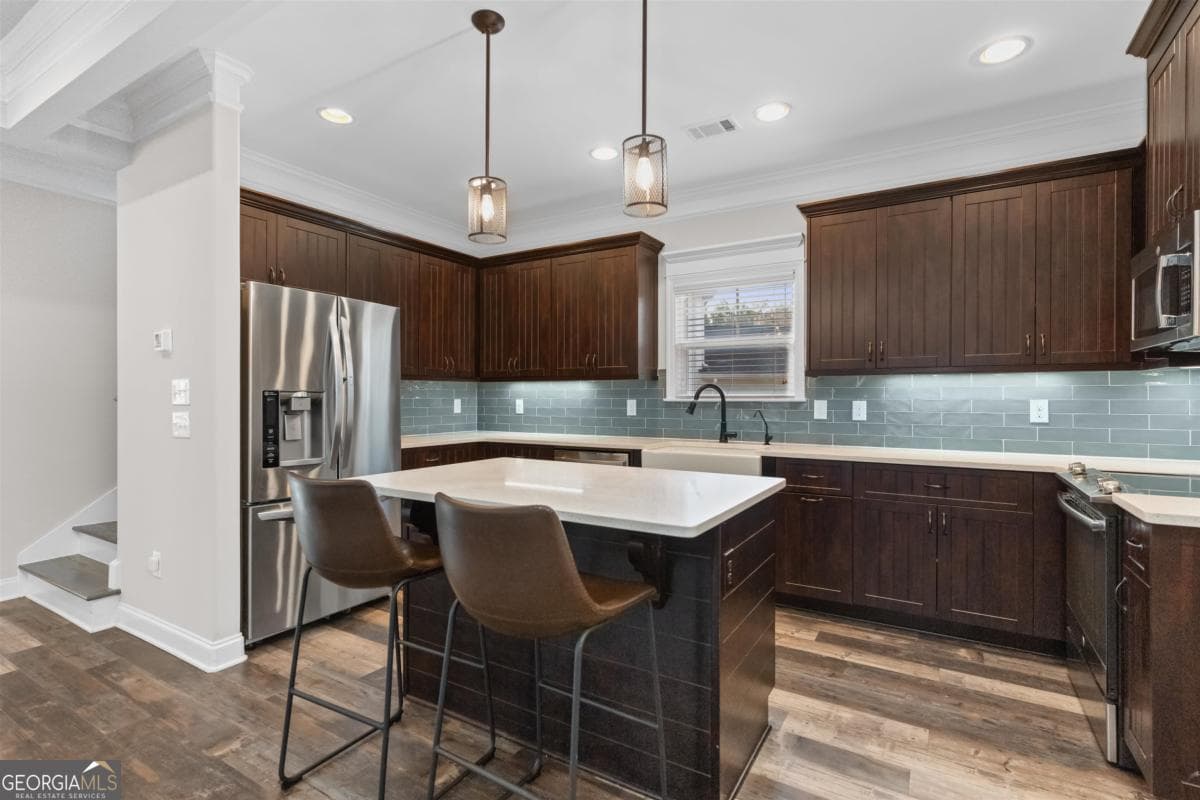 4 bedroom, 3 bathroom, 2,352 sq ft single family residence for sale at 1231 Carriage Ridge Drive, Greensboro, GA 30642 — photo 3