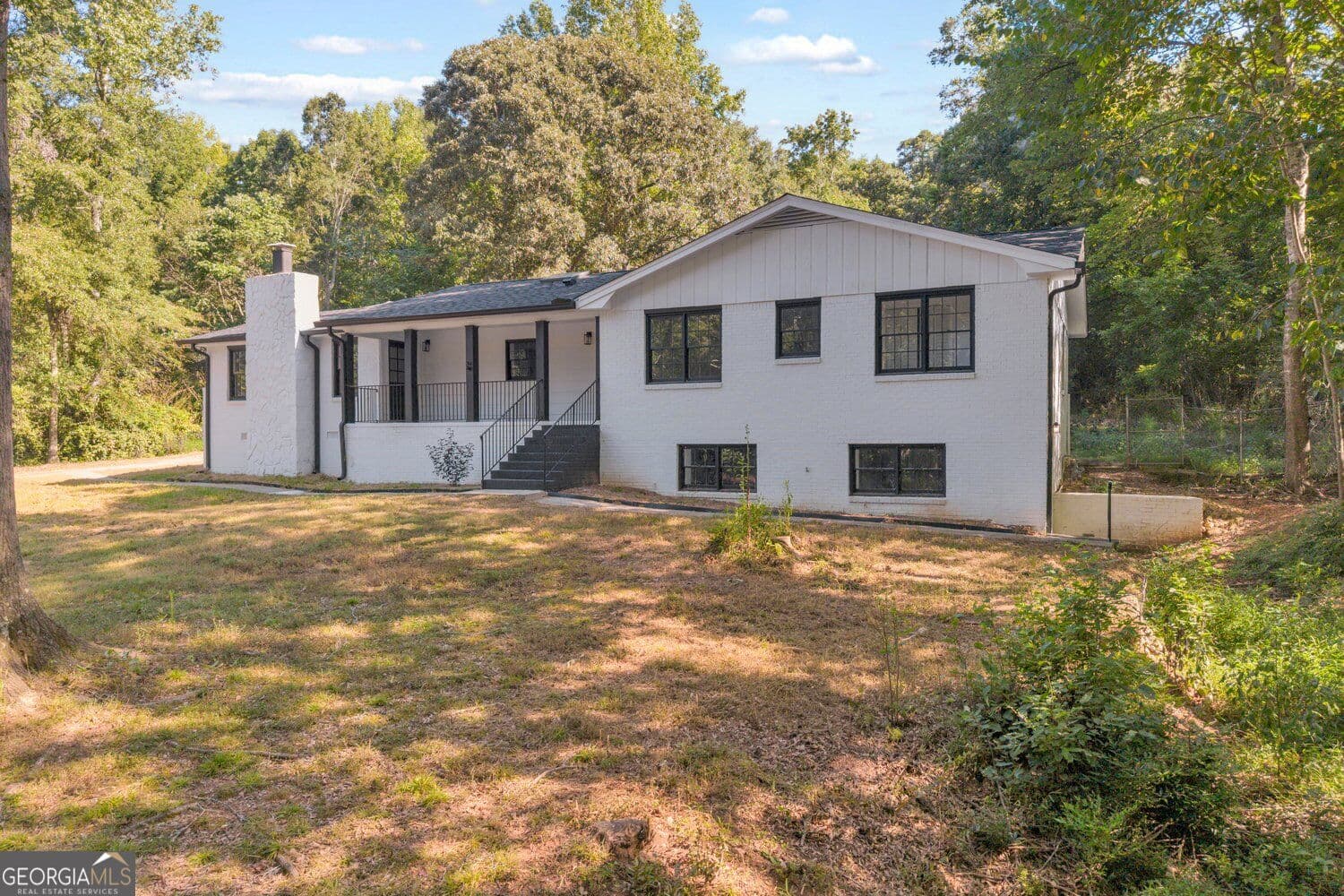4 bedroom, 3.5 bathroom, 3,097 sq ft single family residence for sale at 165 N Morning Dove Drive, Fayetteville, GA 30215 — photo 2