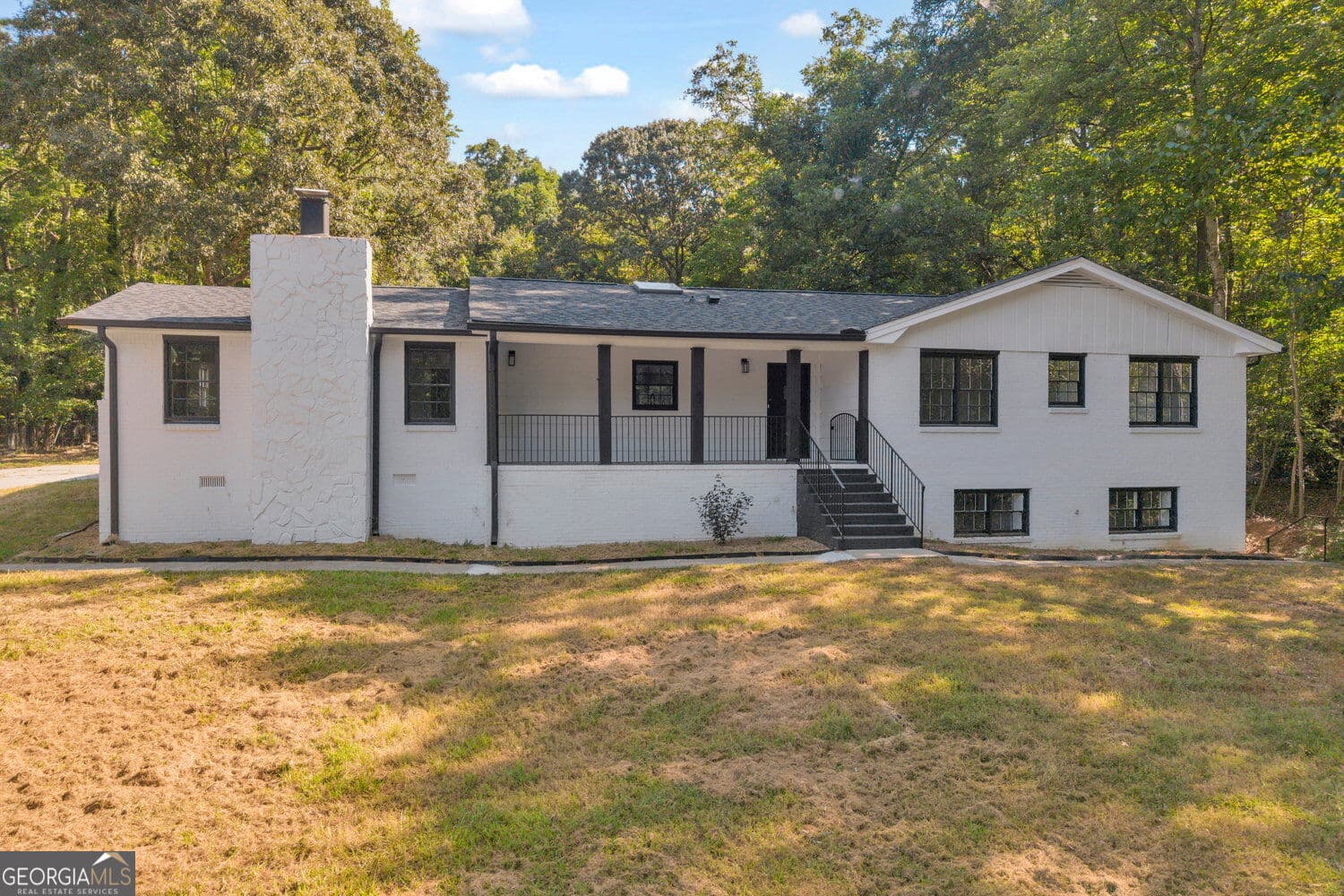 4 bedroom, 3.5 bathroom, 3,097 sq ft single family residence for sale at 165 N Morning Dove Drive, Fayetteville, GA 30215 — photo 1 of 83