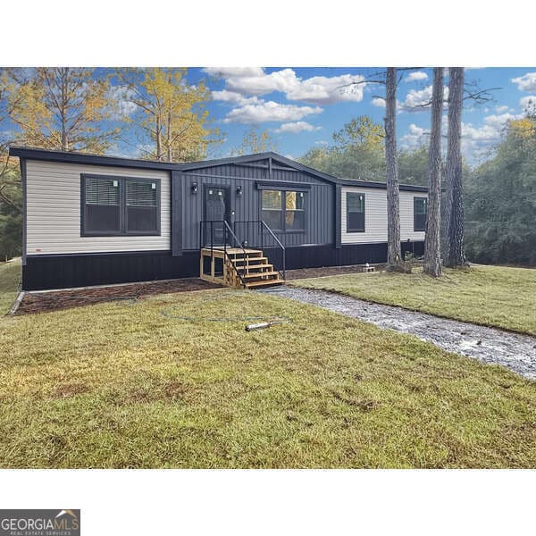 3 bedroom, 2 bathroom, 1,680 sq ft manufactured home,single family residence for sale at 415 Oliver Road, Barnesville, GA 30204