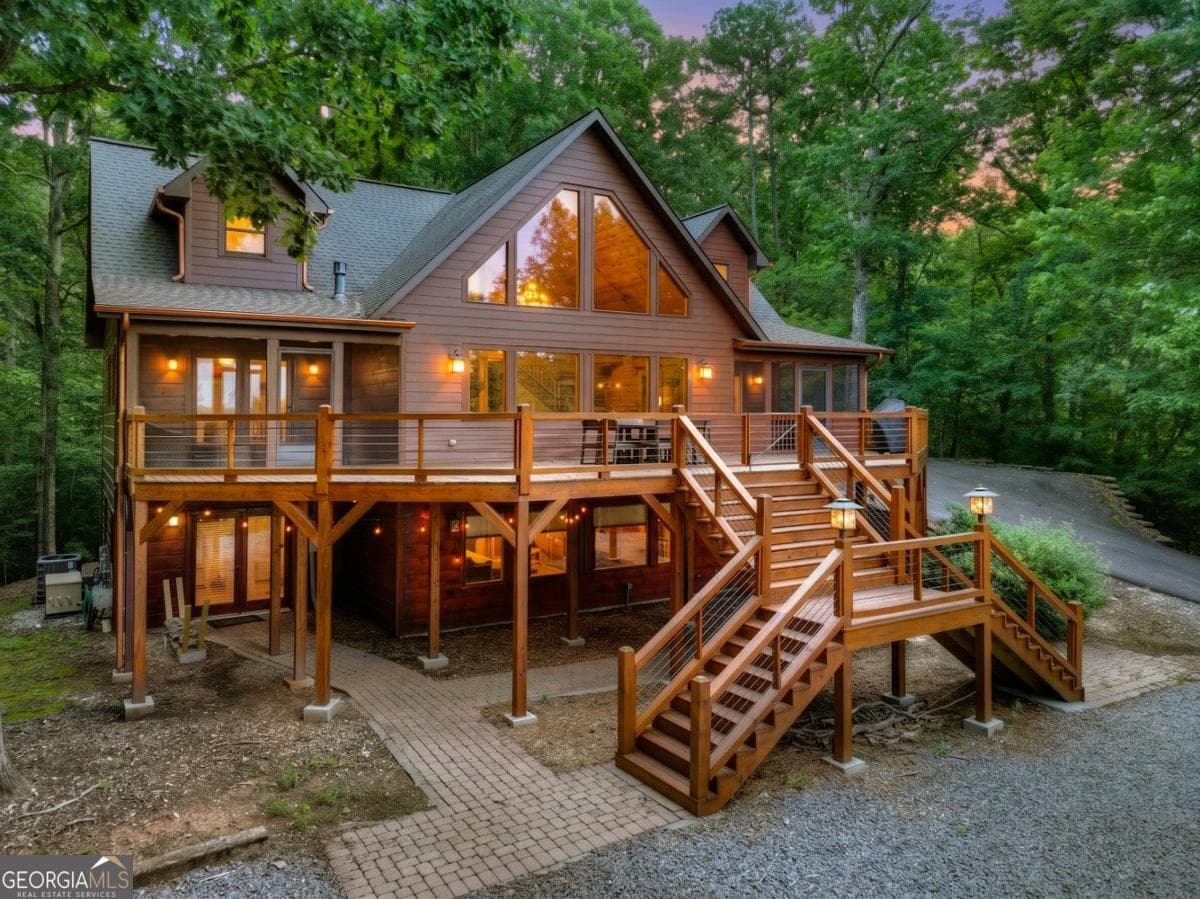 5 bedroom, 3.5 bathroom, 3,937 sq ft cabin,single family residence for sale at 85 Squirrel Chase, Morganton, GA 30560 — photo 2
