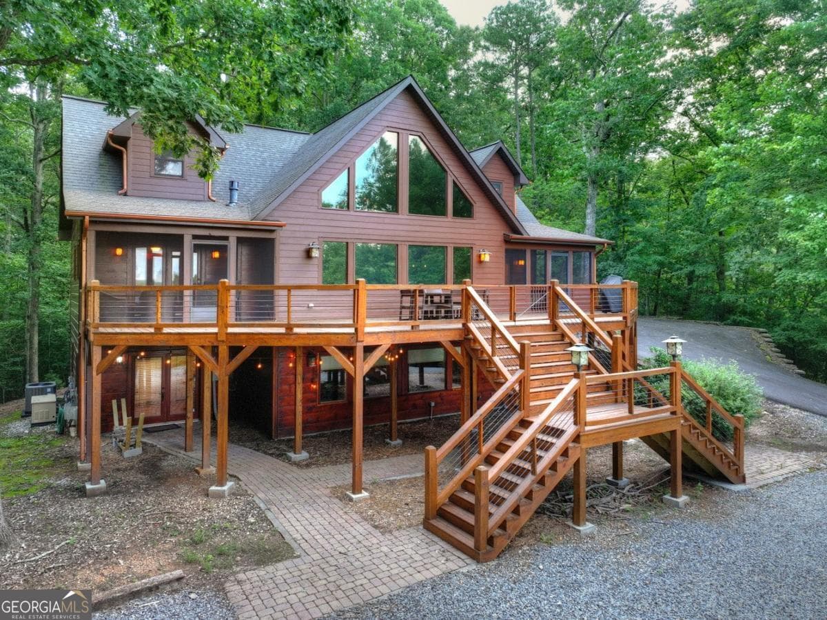 5 bedroom, 3.5 bathroom, 3,937 sq ft cabin,single family residence for sale at 85 Squirrel Chase, Morganton, GA 30560 — photo 3