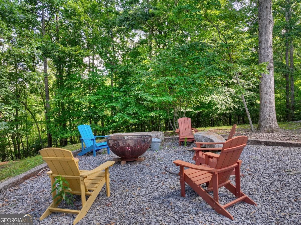 5 bedroom, 3.5 bathroom, 3,937 sq ft cabin,single family residence for sale at 85 Squirrel Chase, Morganton, GA 30560 — photo 5