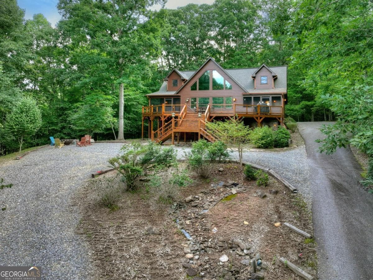 5 bedroom, 3.5 bathroom, 3,937 sq ft cabin,single family residence for sale at 85 Squirrel Chase, Morganton, GA 30560 — photo 4
