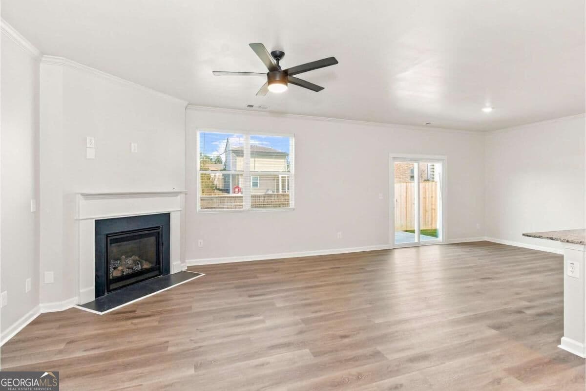 4 bedroom, 2.5 bathroom, 2,192 sq ft single family residence for sale at 5772 Screech Owl Drive, Flowery Branch, GA 30542 — photo 3