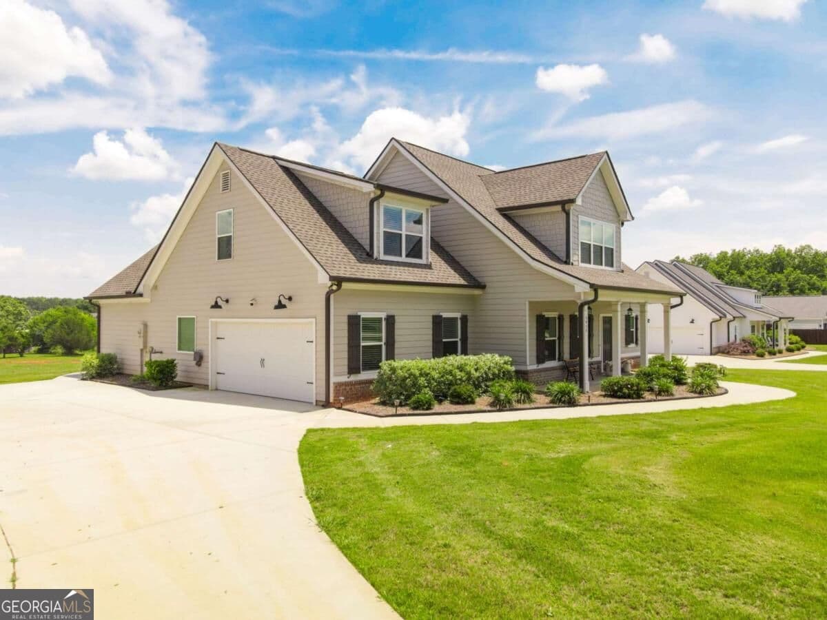 4 bedroom, 2.5 bathroom, 2,724 sq ft single family residence for sale at 1515 Gratis Road, Monroe, GA 30656 — photo 2