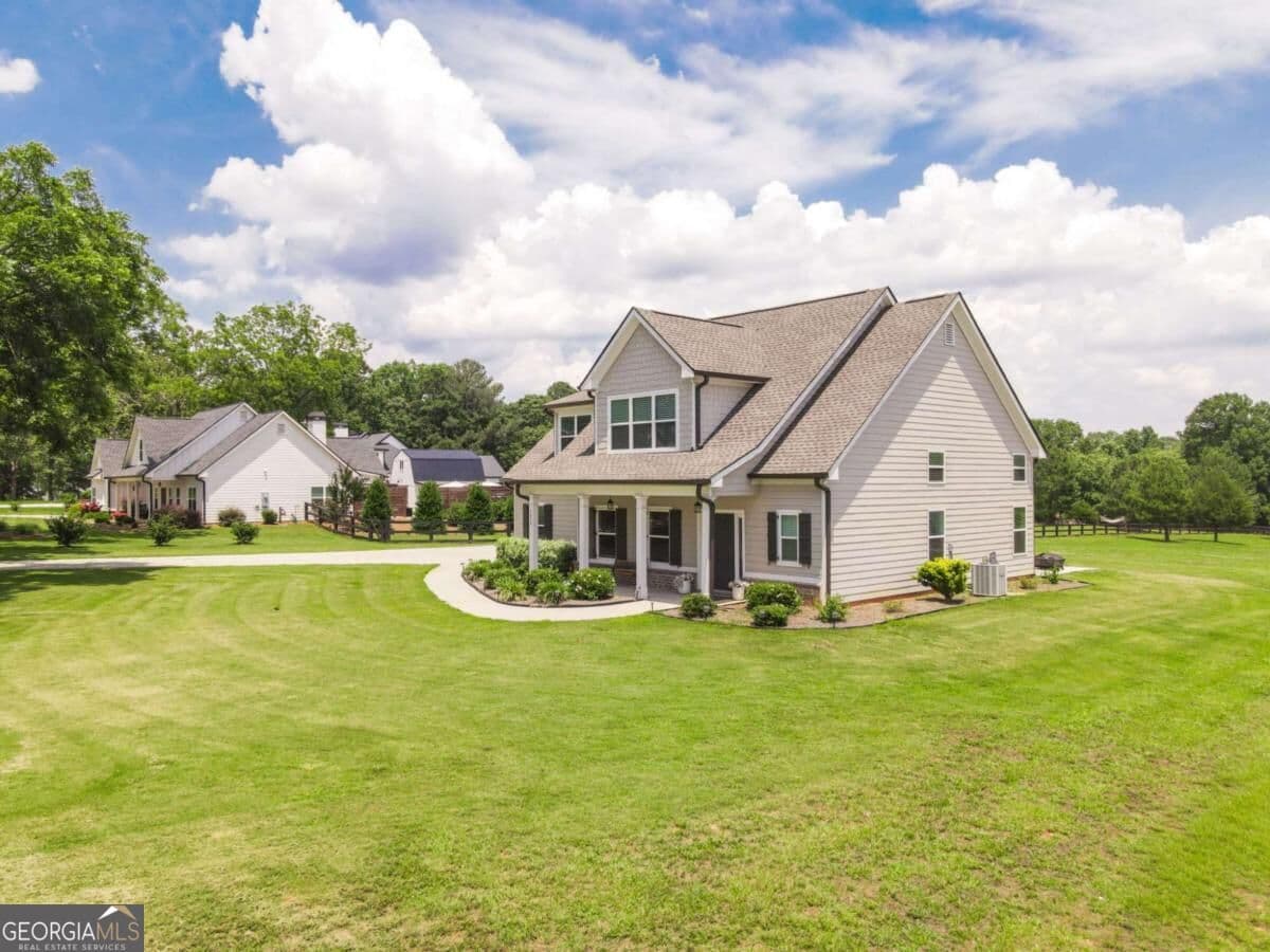 4 bedroom, 2.5 bathroom, 2,724 sq ft single family residence for sale at 1515 Gratis Road, Monroe, GA 30656 — photo 3