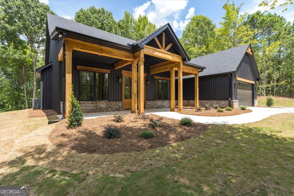 3 bedroom, 2.5 bathroom, 1,732 sq ft single family residence for sale at 1273 English Road, Forsyth, GA 31029 — photo 2