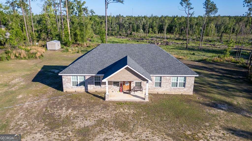 3 bedroom, 2 bathroom, 1,650 sq ft single family residence for sale at 333 E Gillis Street, Mount Vernon, GA 30445 — photo 2