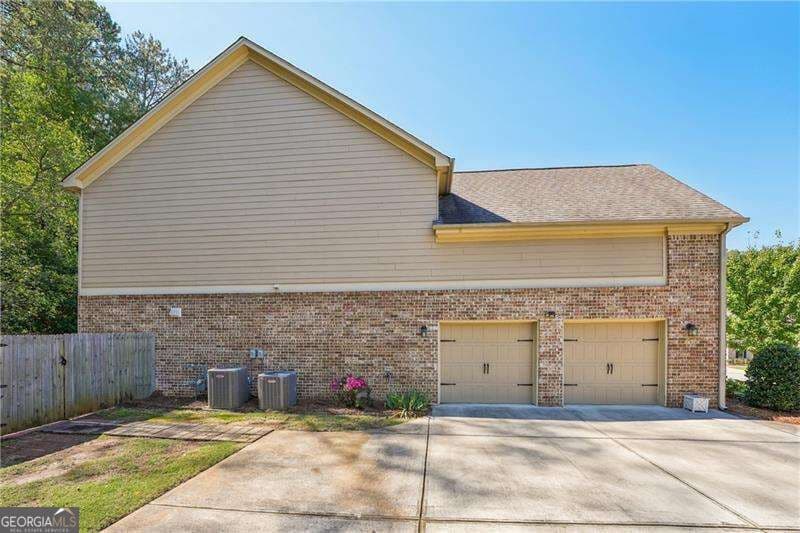 5 bedroom, 3.5 bathroom single family residence for sale at 3619 Reevley Lane, Tucker, GA 30084 — photo 3