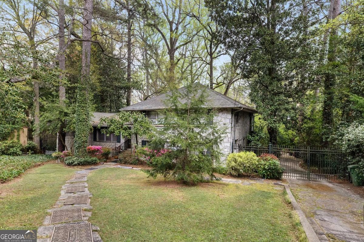 4 bedroom, 3 bathroom, 2,793 sq ft single family residence for sale at 747 Lullwater Road, Atlanta, GA 30307 — photo 2