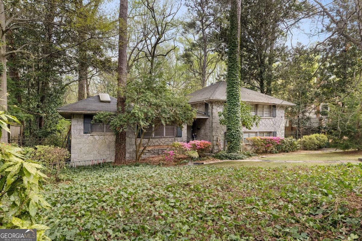 4 bedroom, 3 bathroom, 2,793 sq ft single family residence for sale at 747 Lullwater Road, Atlanta, GA 30307 — photo 4