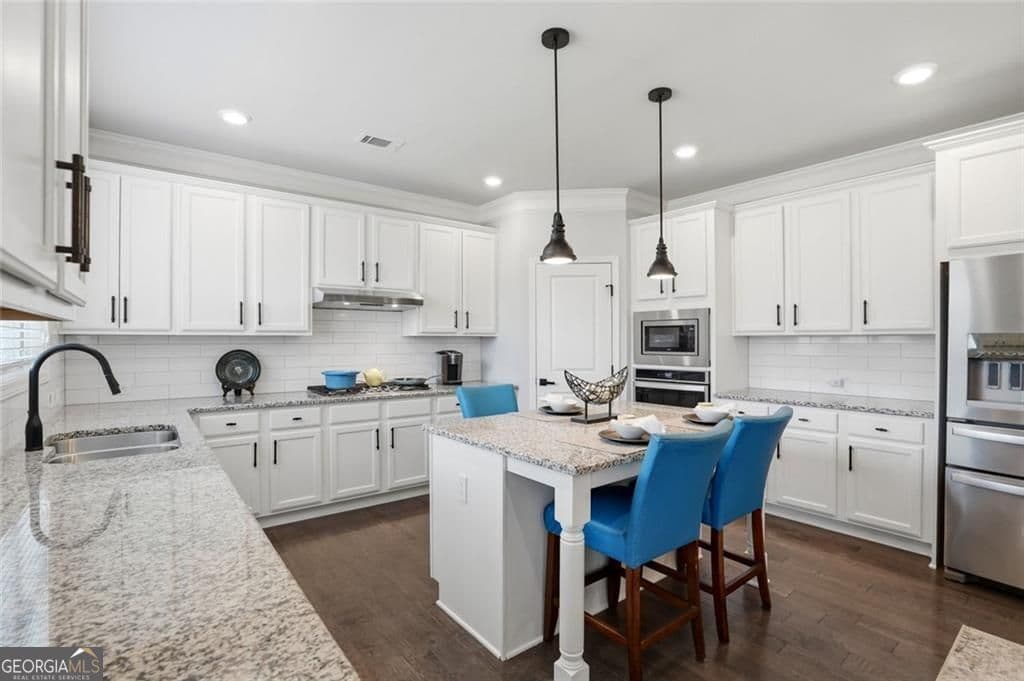 6 bedroom, 5 bathroom, 4,347 sq ft single family residence for sale at 1883 Hampton Grove Way, Dacula, GA 30019 — photo 8