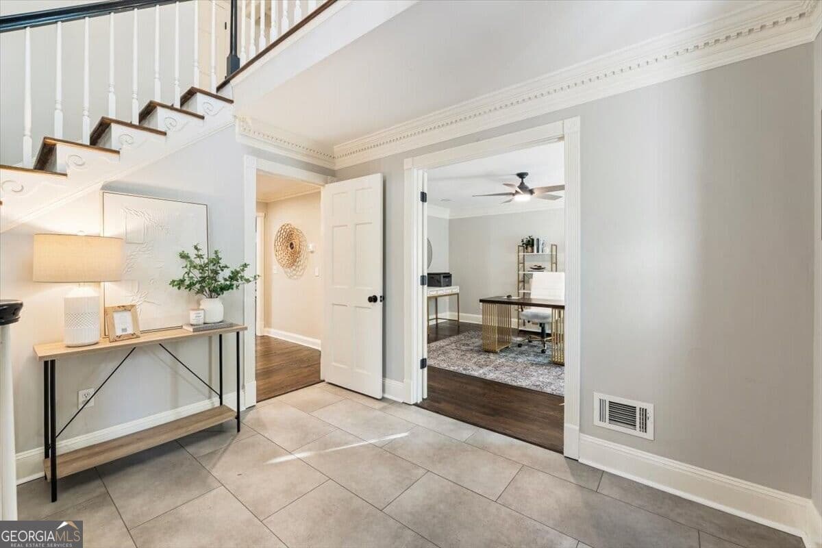 6 bedroom, 4.5 bathroom, 5,587 sq ft single family residence for sale at 235 Landfall Road, Sandy Springs, GA 30328 — photo 5
