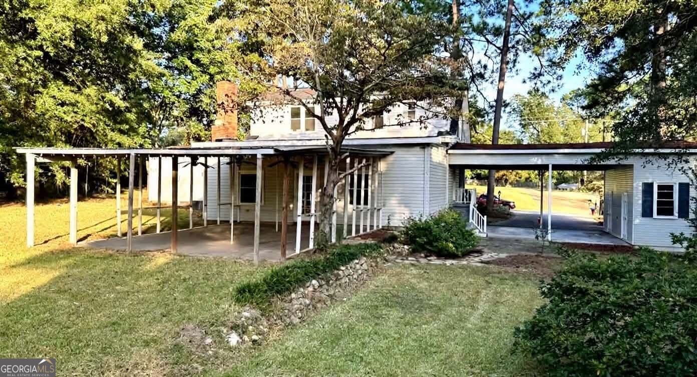 4 bedroom, 2 bathroom, 2,360 sq ft single family residence for sale at 98 McCormick Avenue, Hawkinsville, GA 31036 — photo 3