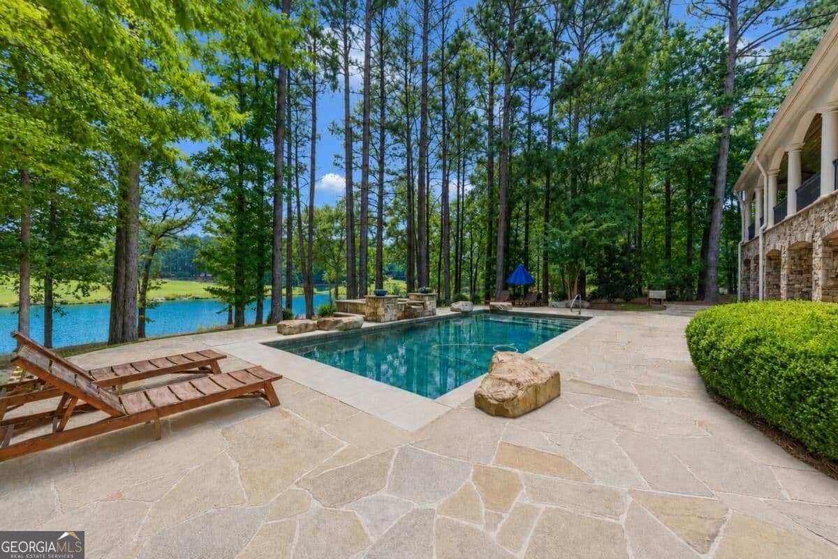 5 bedroom, 6.5 bathroom, 6,177 sq ft single family residence for sale at 1241 Lake Club Drive, Greensboro, GA 30642 — photo 3