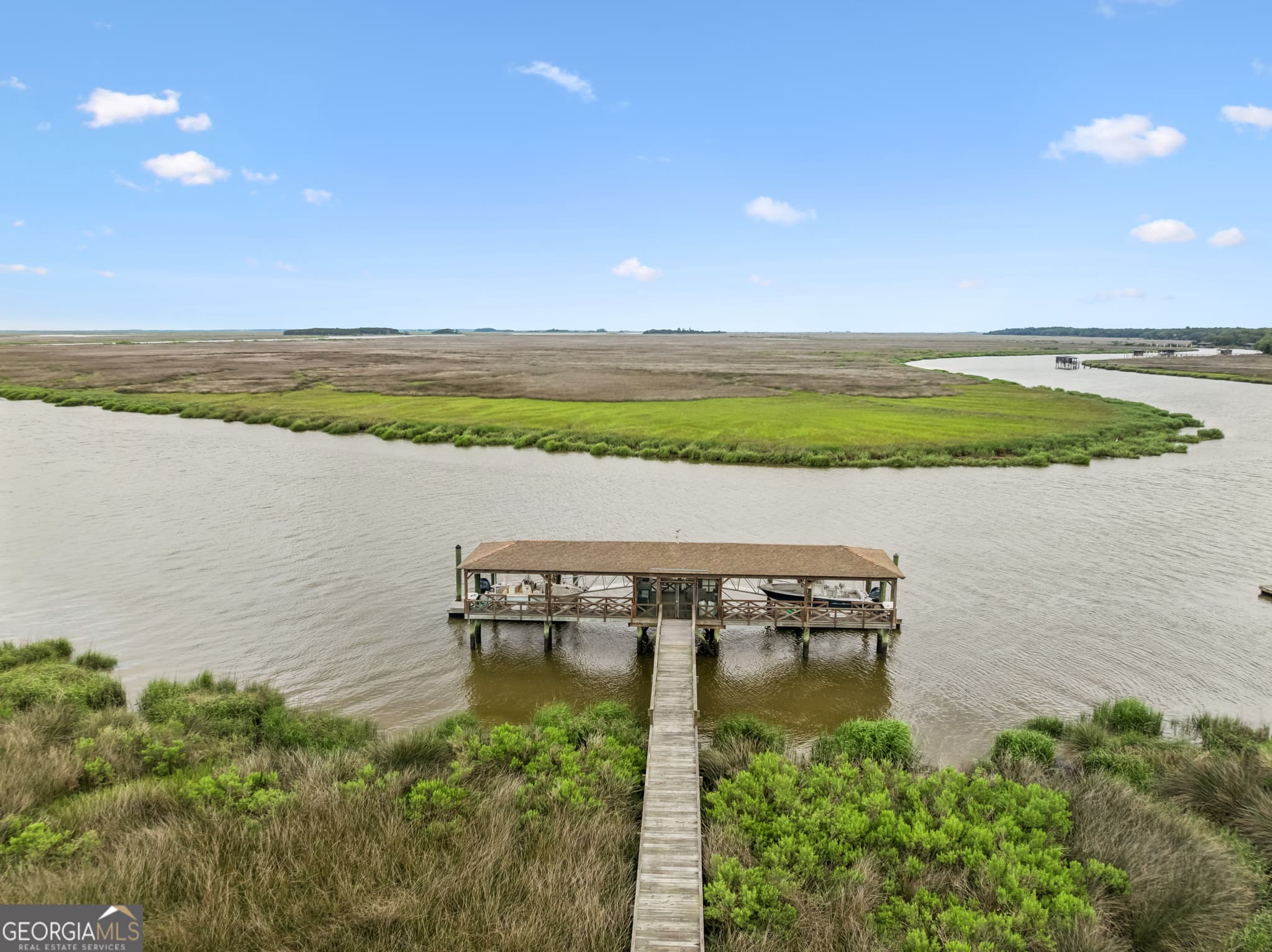 5 bedroom, 5.5 bathroom, 6,000 sq ft single family residence for sale at 423 Mimosa Drive, St. Simons, GA 31522 — photo 3