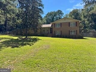 5 bedroom, 3 bathroom, 2,352 sq ft single family residence for sale at 204 Glen Drive, East Dublin, GA 31027 — photo 4