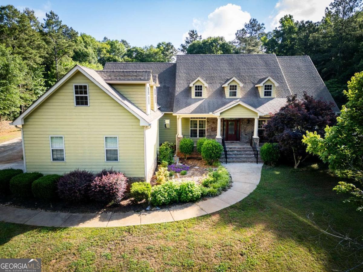 6 bedroom, 3.5 bathroom, 5,166 sq ft single family residence for sale at 283 Creekside Drive, Arnoldsville, GA 30619 — photo 2
