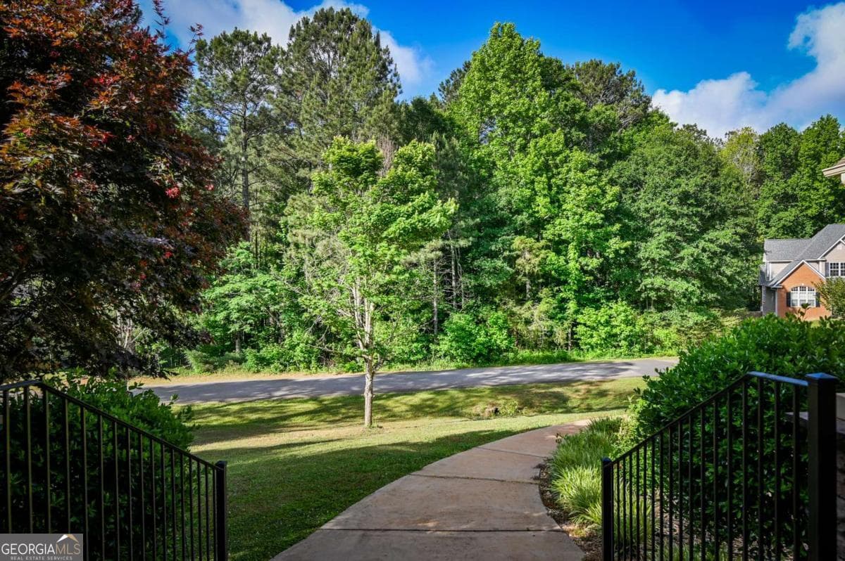 6 bedroom, 3.5 bathroom, 5,166 sq ft single family residence for sale at 283 Creekside Drive, Arnoldsville, GA 30619 — photo 6
