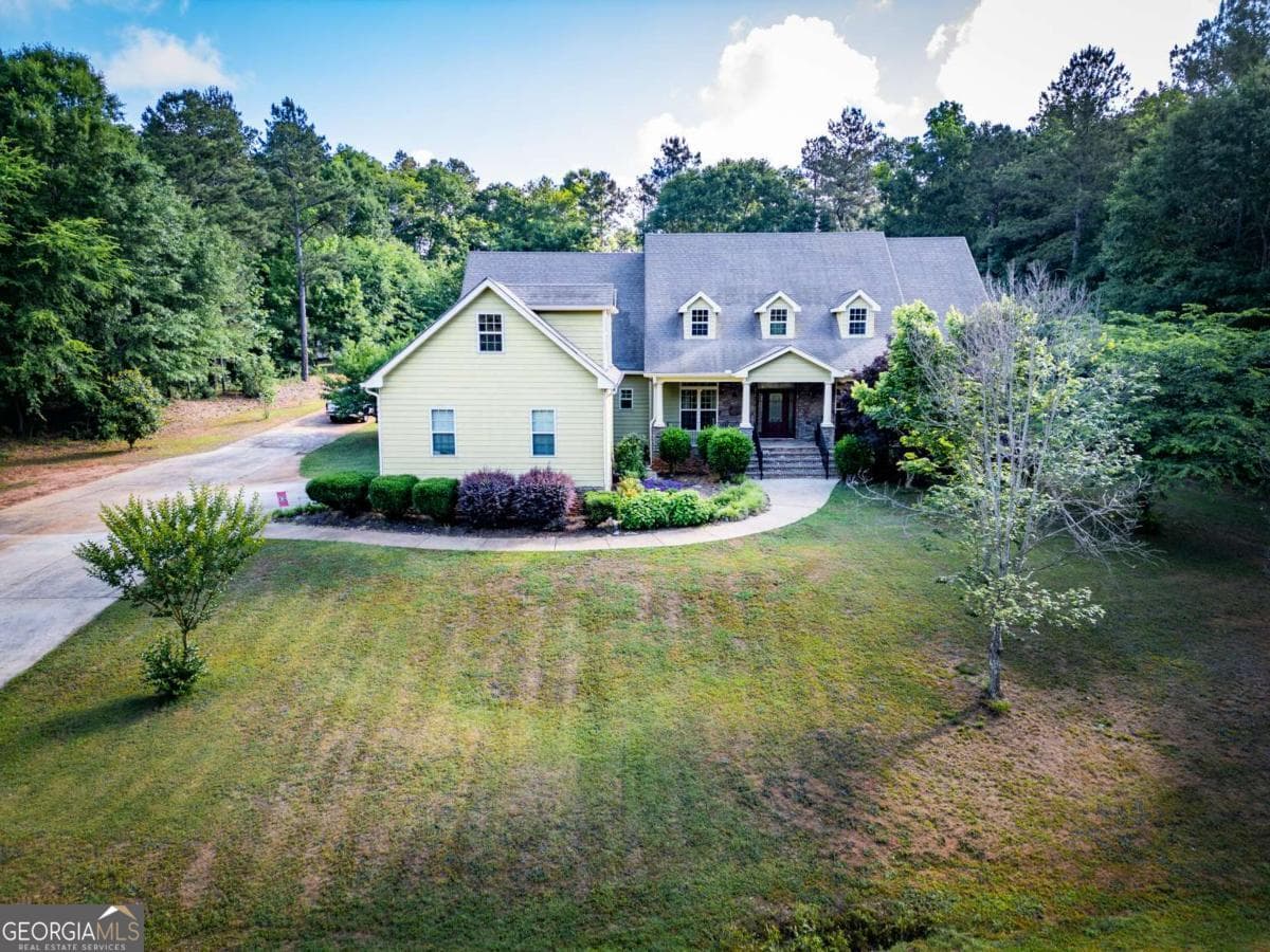 6 bedroom, 3.5 bathroom, 5,166 sq ft single family residence for sale at 283 Creekside Drive, Arnoldsville, GA 30619 — photo 3