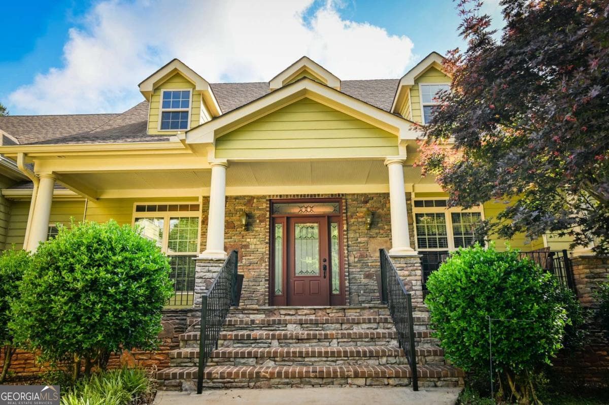 6 bedroom, 3.5 bathroom, 5,166 sq ft single family residence for sale at 283 Creekside Drive, Arnoldsville, GA 30619 — photo 4