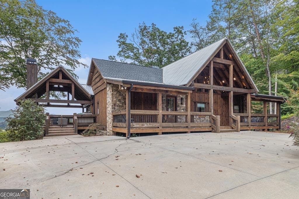 5 bedroom, 4.5 bathroom, 3,848 sq ft cabin,single family residence for sale at 142 Mountain Trace, Ellijay, GA 30540
