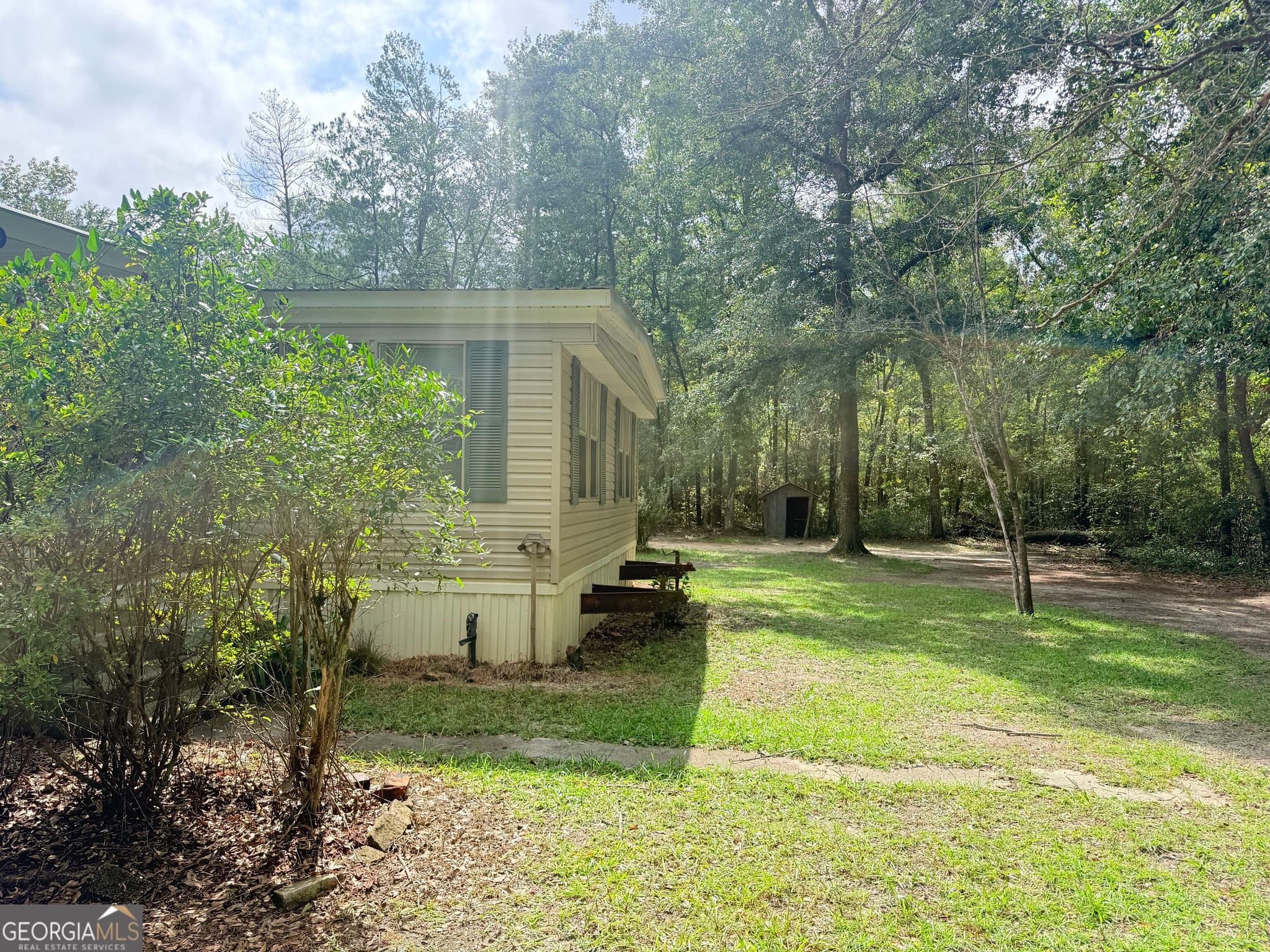 3 bedroom, 2 bathroom manufactured home,single family residence under contract at 587 Kendricks Road, Brooklet, GA 30415 — photo 4