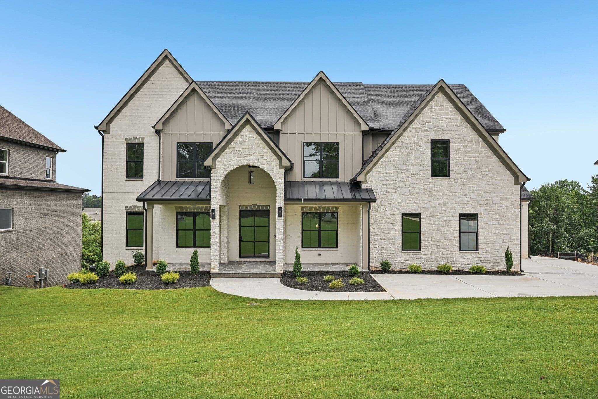 5 bedroom, 5.5 bathroom, 5,782 sq ft single family residence for sale at 3263 N Bogan Road, Buford, GA 30519 — photo 1 of 49