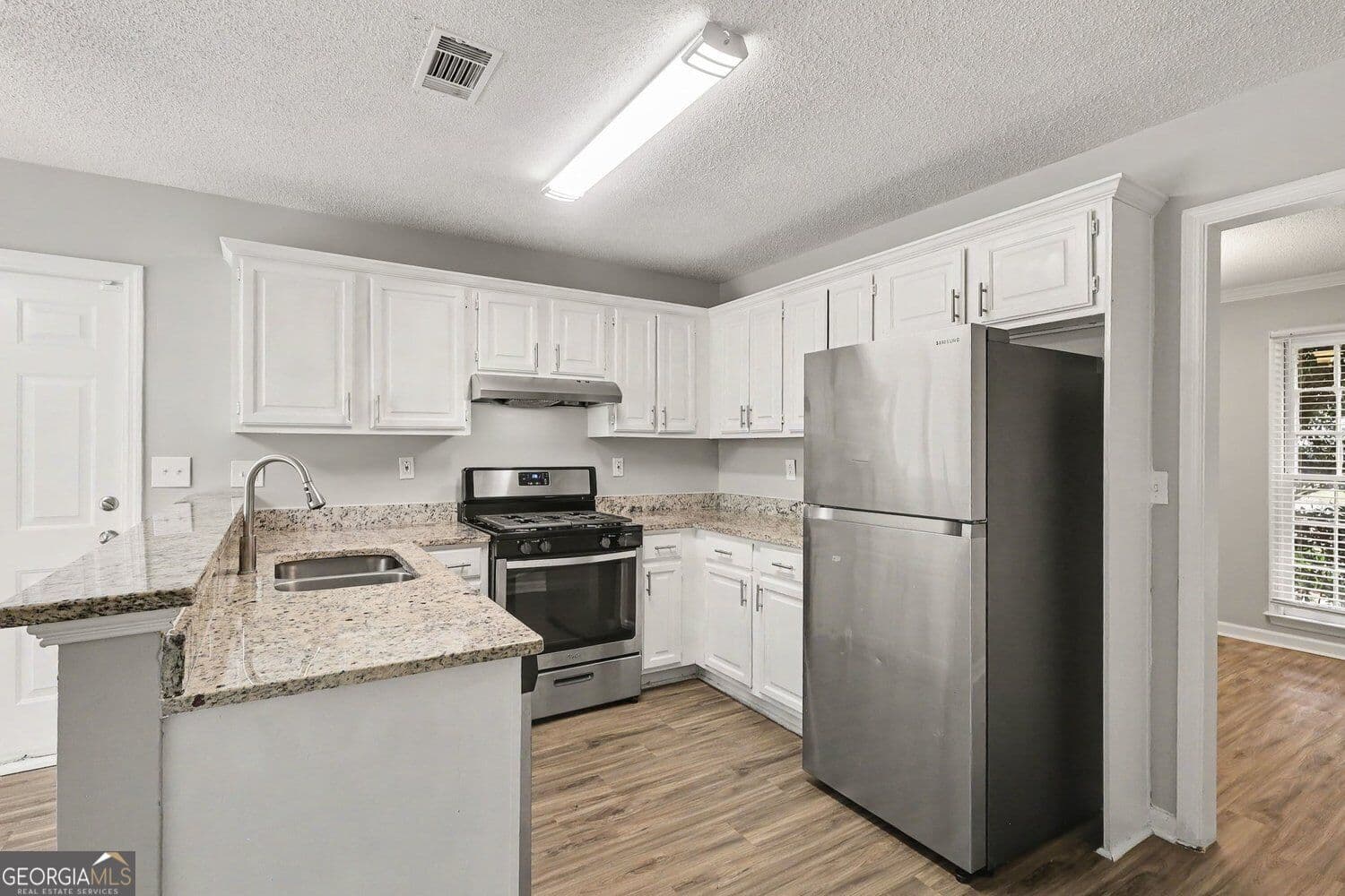 3 bedroom, 2.5 bathroom, 1,714 sq ft single family residence for sale at 3131 Ashbury Lane, Rex, GA 30273 — photo 10