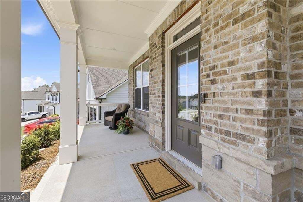 5 bedroom, 4 bathroom, 3,776 sq ft single family residence for sale at 6116 Black Pear Lane, Gainesville, GA 30506 — photo 4