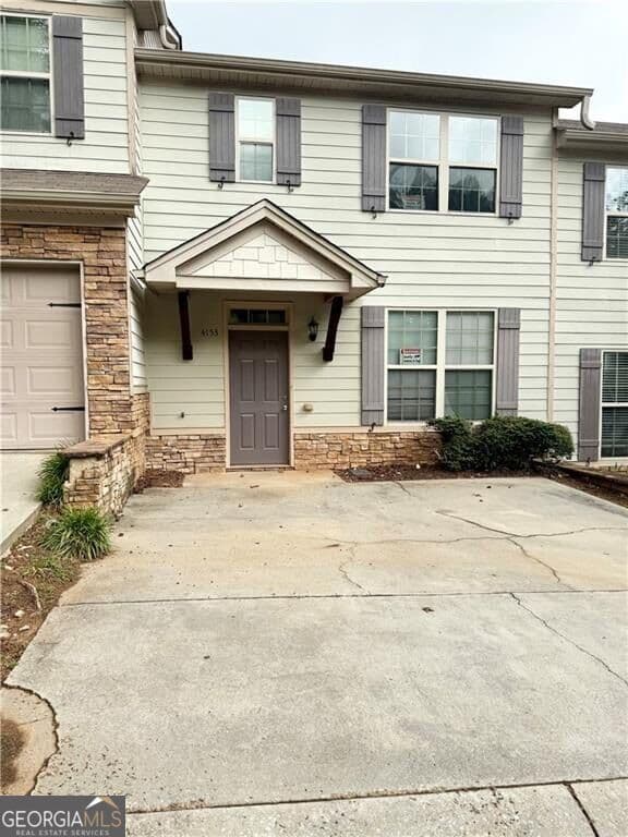 3 bedroom, 2.5 bathroom townhouse for rent at 4153 Park Chase Drive, East Point, GA 30344 for $1,795 a month — photo 1 of 20