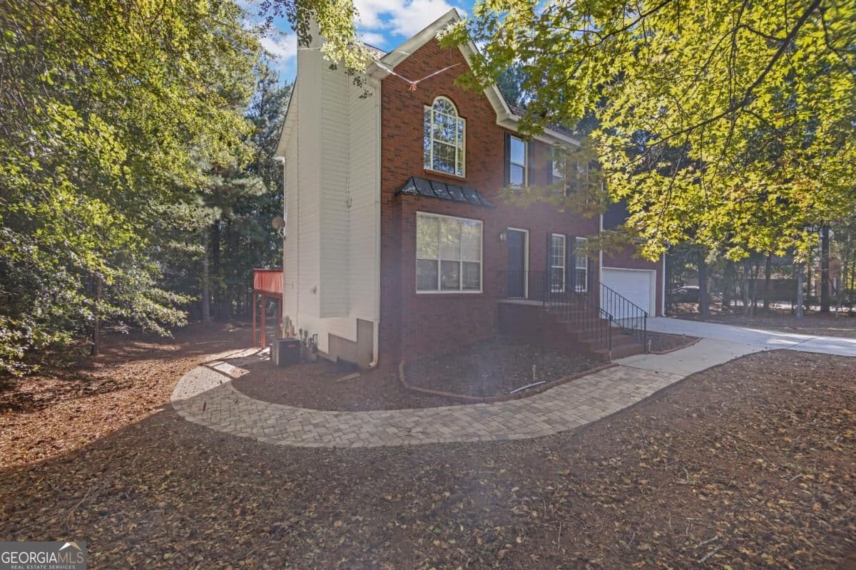 5 bedroom, 3.5 bathroom, 2,902 sq ft single family residence for sale at 1004 Crown River Parkway, Mcdonough, GA 30252 — photo 2