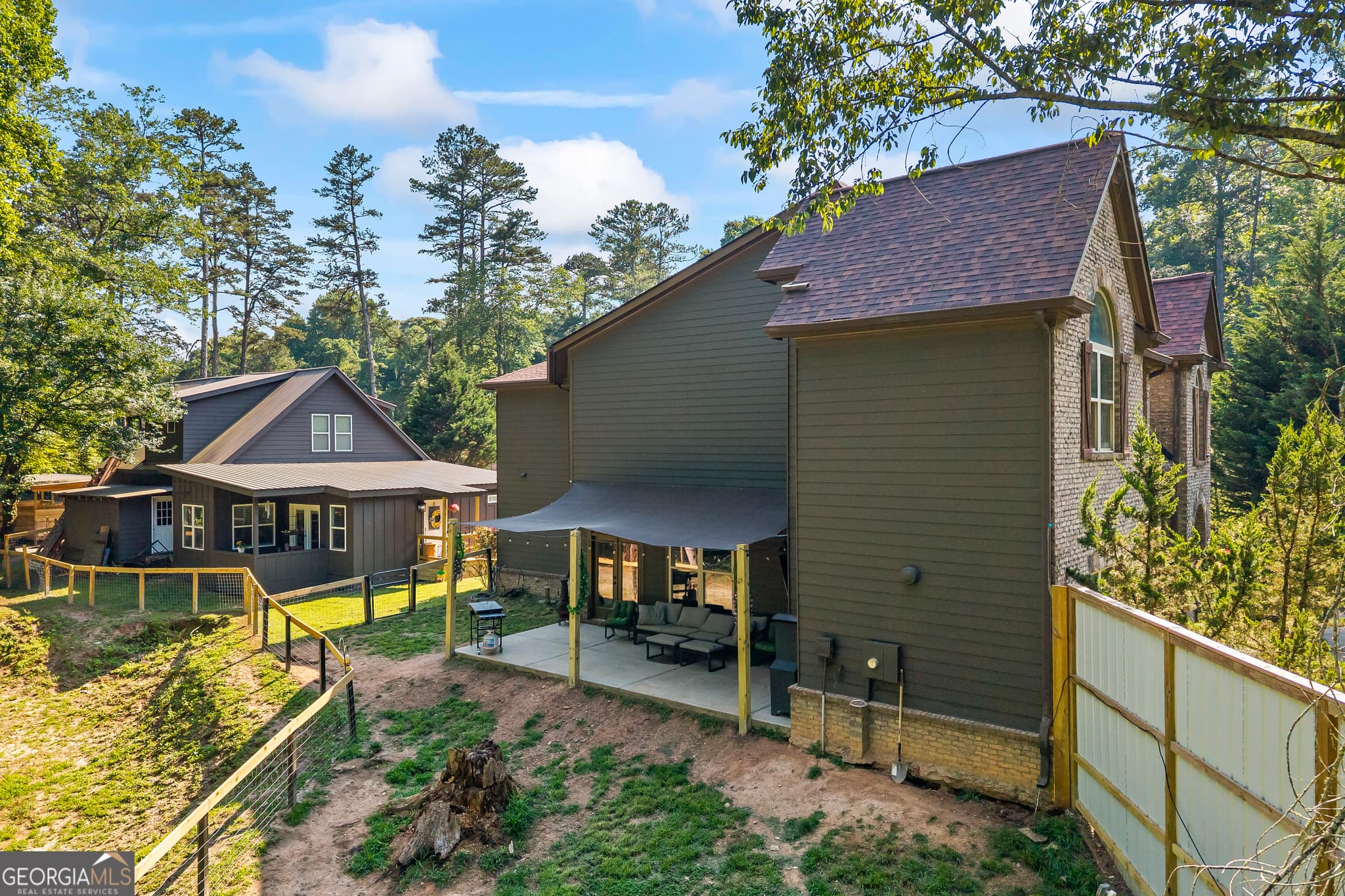 7 bedroom, 6.5 bathroom, 3,171 sq ft single family residence for sale at 9315 Meadowbrook Drive, Gainesville, GA 30506 — photo 3