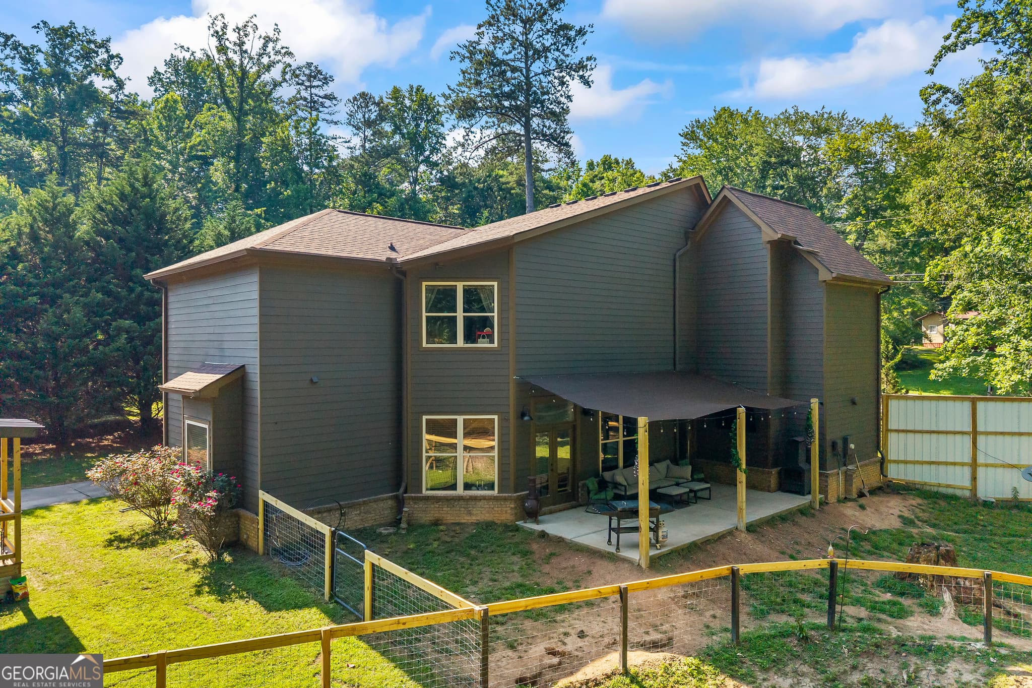 7 bedroom, 6.5 bathroom, 3,171 sq ft single family residence for sale at 9315 Meadowbrook Drive, Gainesville, GA 30506 — photo 5